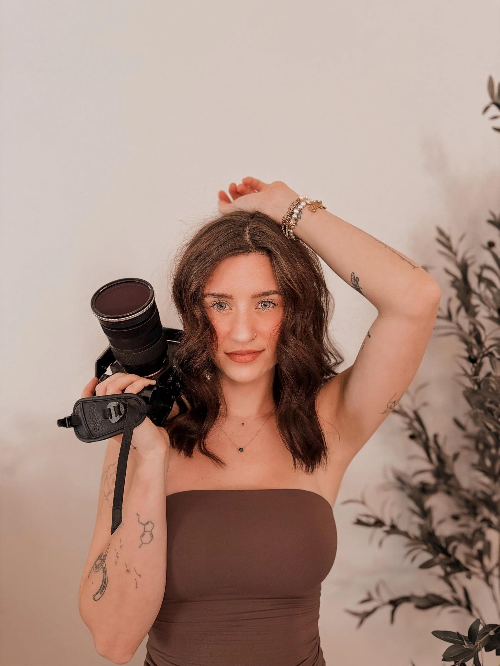 Amie Pulizzano holding her camera